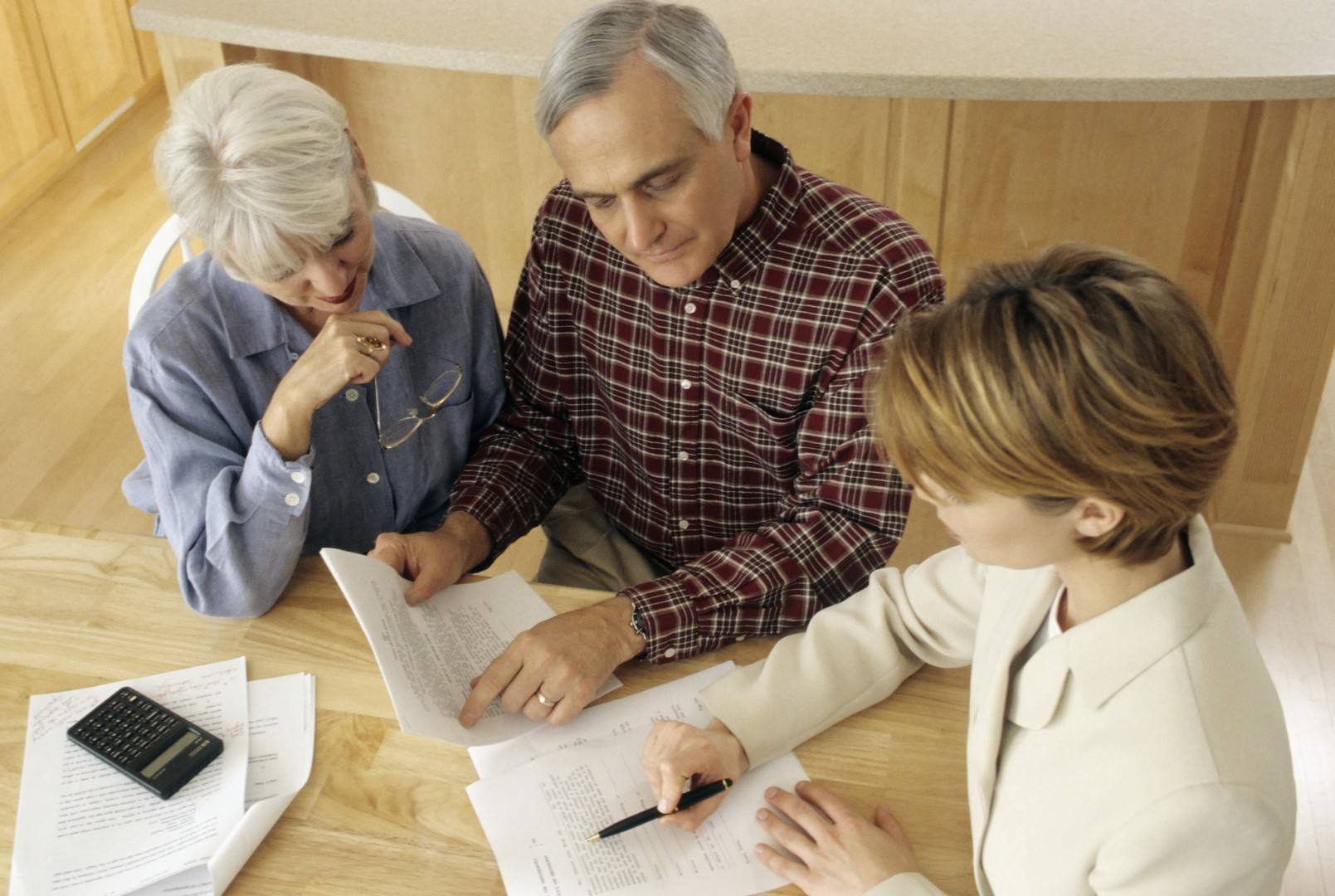 Senior couple meeting with agent